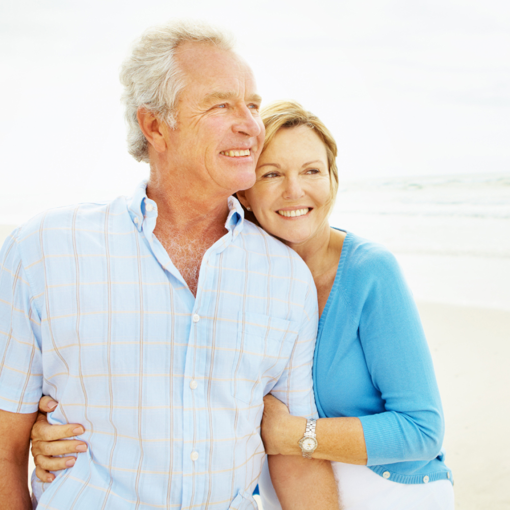 Elderly couple on beach